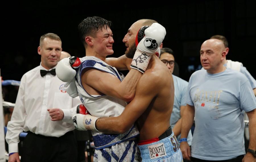 Bradley Skeete hugs John Thain after winning the fight Mandatory. Bradley Skeete,John Thain,Bradley Skeete beats John Thain,British welterweight title,welterweight title,Britain Boxing