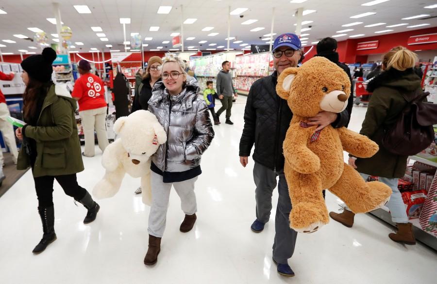 Customers walk through an aisle at Target in Chicago. Thanksgiving,Thanksgiving bargain hunt,Black Friday frenzy,Black Friday frenzy pics,Black Friday frenzy images,Black Friday frenzy photos,Black Friday frenzy stills,Black Friday frenzy pictures