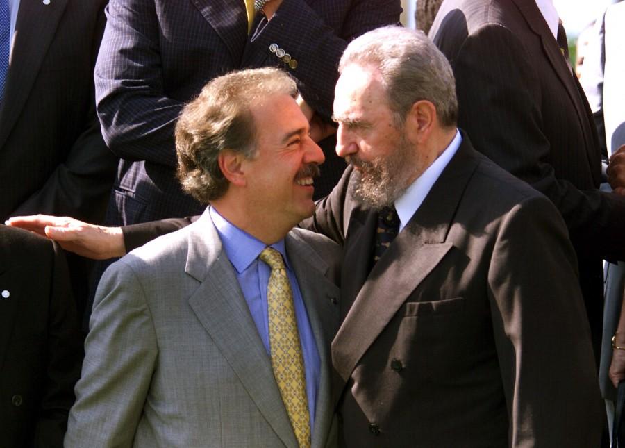 Caribbean Presidents of Colombia Andres Pastrana (L) and Cuba's Fidel Castro chat April 17, minutes before the official photo. More than 20 Caribbean heads of state attend to the second summit of the Association of Caribbean States. Fidel Castro,Fidel Castro dead,Fidel Castro cuba,Fidel Castro dies,Fidel Castro passes away,Fidel Castro Iconic photos,Fidel Castro Iconic pics,Fidel Castro Iconic images,Fidel Castro rare pics,Fidel Castro rare images,Fidel Castro rare photos,Fidel Castr
