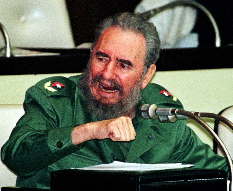 Cuba's President Fidel Castro gestures during a session at the National Assembly in Havana February 15. Cuba, moving to defend its socialist system against rising crime and U.S. sanctions, announced on Monday harsh new penalties against criminals and political opponents who collaborated with the U.S. government. Fidel Castro,Fidel Castro dead,Fidel Castro cuba,Fidel Castro dies,Fidel Castro passes away,Fidel Castro Iconic photos,Fidel Castro Iconic pics,Fidel Castro Iconic images,Fidel Castro rare pics,Fidel Castro rare images,Fidel Castro rare photos,Fidel Castr