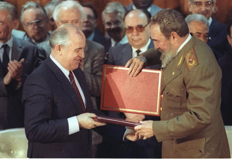 Soviet Leader Mikhail Gorbachev and Cuban President Fidel Castro exchange treaties of friendship and cooperation which they signed during a ceremony in Havana. Fidel Castro,Fidel Castro dead,Fidel Castro cuba,Fidel Castro dies,Fidel Castro passes away,Fidel Castro Iconic photos,Fidel Castro Iconic pics,Fidel Castro Iconic images,Fidel Castro rare pics,Fidel Castro rare images,Fidel Castro rare photos,Fidel Castr