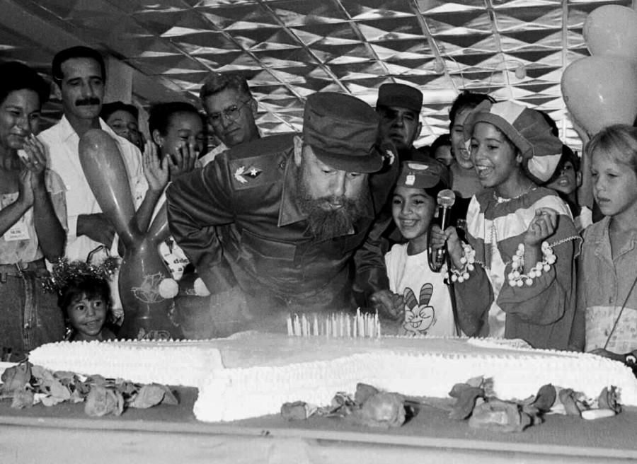 Cuban President Fidel Castro is shown blowing the birthday candles on his 70th birthday in this file photo in Havana, August 13, 1996. Fidel Castro,Fidel Castro dead,Fidel Castro cuba,Fidel Castro dies,Fidel Castro passes away,Fidel Castro Iconic photos,Fidel Castro Iconic pics,Fidel Castro Iconic images,Fidel Castro rare pics,Fidel Castro rare images,Fidel Castro rare photos,Fidel Castr