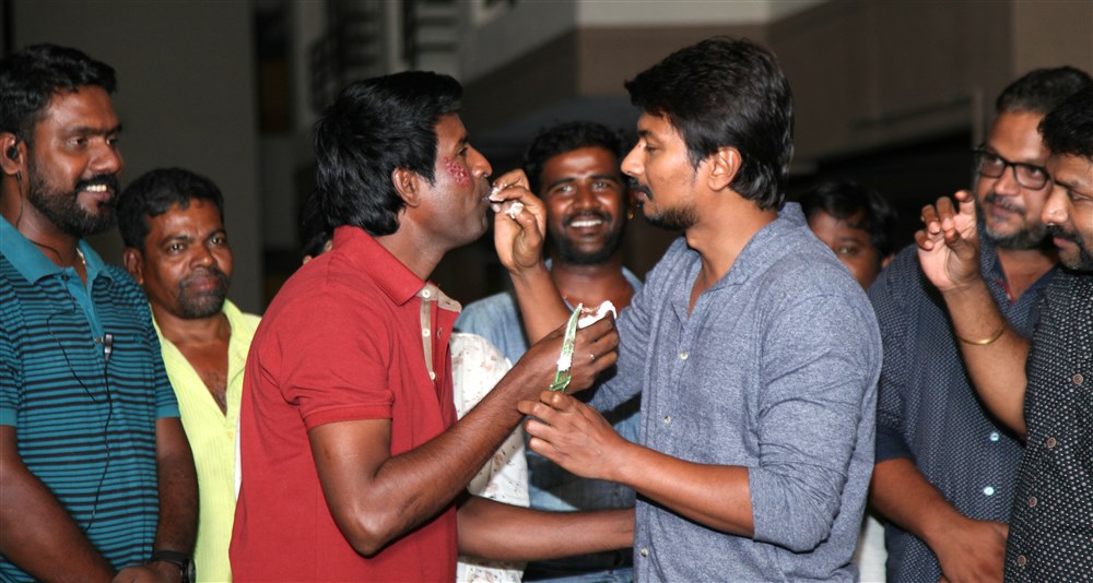 South Indian actor Udhayanidhi Stalin celebrated his Birthday at the Sets Gaurav Narayanan movie shoot. Celebs like Soori, Manjima Mohan, Daniel Balaji and others graced the event. Manjima Mohan,Soori,Udhayanidhi Stalin birthday celebration,Udhayanidhi Stalin birthday,Udhayanidhi Stalin,Udhayanidhi Stalin birthday celebration pics,Udhayanidhi Stalin birthday celebration images,Udhayanidhi Stalin birthday celebration photos,Udhayanid
