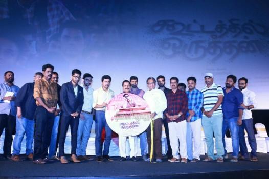 Tamil movie Kootathil Oruthan audio launch event held in Chennai. Celebs like Suriya, Sivakumar, Ashok Selvan, Nasser, RJ Balaji, Priya Anand, Nivas Prasanna and others graced the event.