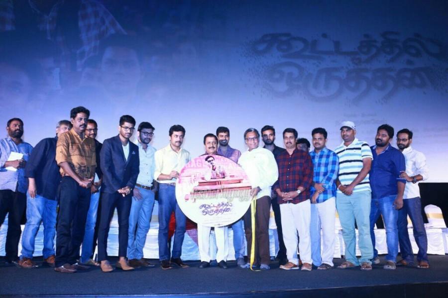 Tamil movie Kootathil Oruthan audio launch event held in Chennai. Celebs like Suriya, Sivakumar, Ashok Selvan, Nasser, RJ Balaji, Priya Anand, Nivas Prasanna and others graced the event. Kootathil Oruthan audio launch,Kootathil Oruthan,Suriya,Sivakumar,Ashok Selvan,Nasser,RJ Balaji,Priya Anand,Nivas Prasanna,Kootathil Oruthan audio launch pics,Kootathil Oruthan audio launch images,Kootathil Oruthan audio launch photos,Kootathil Oruthan au