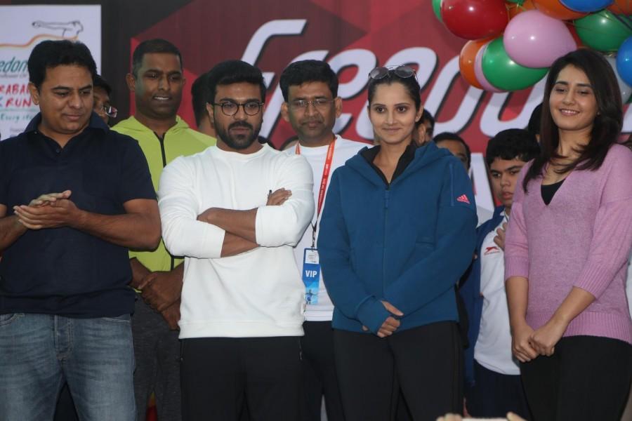 Mega Power Star Ram Charan, Actress Rashi Khanna, Tennis star Sania Mirza, Telangana IT and Municipal Administration Minister KTR have participated in 10K Run, which has been organised at People's Plaza in Hyderabad in order to promote Health and Fitness. Mega Power Star Ram Charan,Ram Charan,Rashi Khanna,Sania Mirza,Minister KTR,Freedom 10K Run,10K Run