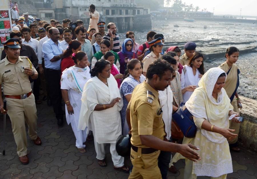 Women enter the famous Haji Ali dargah after five years and a series of legal battles and agitations in Mumbai, on Nov 29, 2016. Till June 2012, women were allowed entry up to the sanctum sanctorum comprising the mazaar (grave) of the revered Muslim saint, Sayyed Peer Haji Ali Shah Bukhari, but suddenly the entry rto women was barred. Mumbai,Haji Ali Dargah After 5 Years,Haji Ali Dargah,Women re-enter Haji Ali dargah,Women enter Haji Ali dargah,Women enters Haji Ali dargah