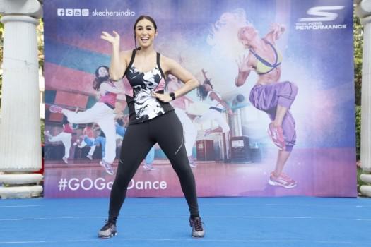 Photos of Bollywood actress Lauren Gottlieb at the skechers Go Goa dance press conference.