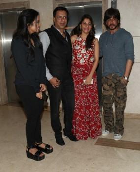 Photos of Maharashtra CM Devendra Fadnavis and Shah Rukh Khan attends Madhur Bhandarkar's house warming party.