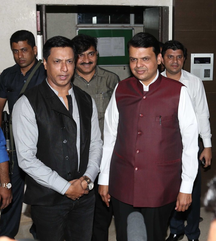 Photos of Maharashtra CM Devendra Fadnavis and Shah Rukh Khan attends Madhur Bhandarkar's house warming party. Devendra Fadnavis,Shah Rukh Khan,SRK,Madhur Bhandarkar,Madhur Bhandarkar house warming party,Celebs at Madhur Bhandarkar house warming party,Madhur Bhandarkar house warming party pics,Madhur Bhandarkar house warming party images,Madhur Bhandarkar house wa