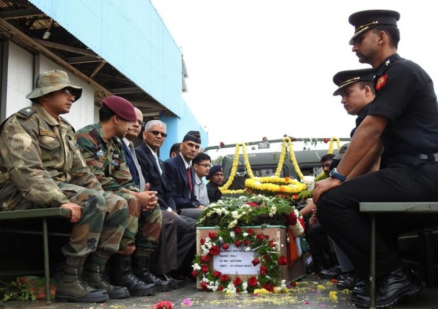 The mortal remains of martyr Major Akshay Girish, who was killed in Nagrota militant attack arrives at Yelahanka Air Force Station in Bengaluru on Dec 1, 2016. Martyr Akshay,Martyr Akshay mortal,Martyr Akshay mortal at Yelahanka AFS,Nagrota militant attack,Yelahanka Air Force Station,Yelahanka Air Force