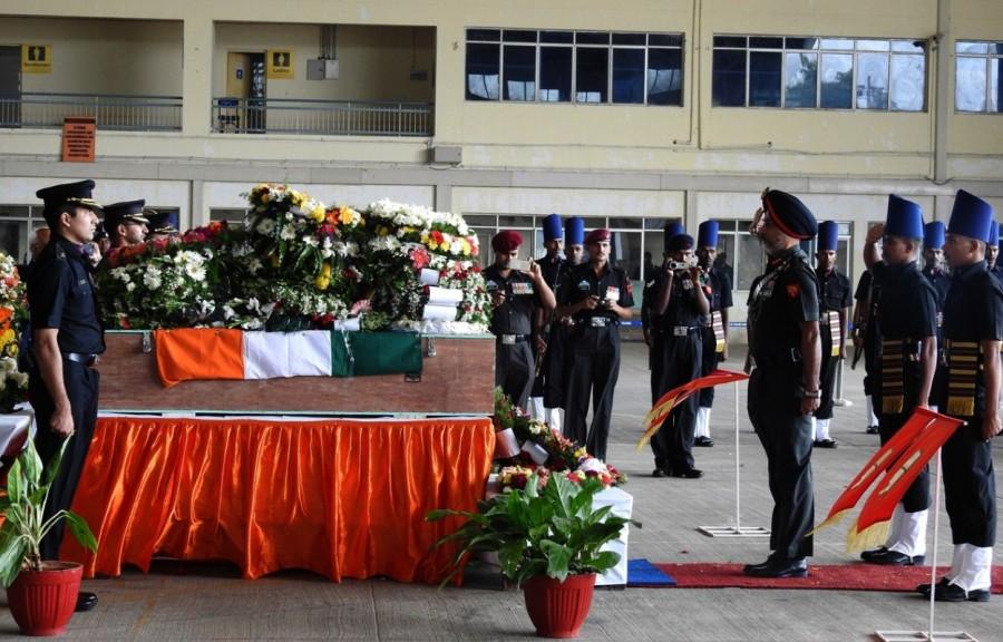The mortal remains of martyr Major Akshay Girish, who was killed in Nagrota militant attack arrives at Yelahanka Air Force Station in Bengaluru on Dec 1, 2016. Martyr Akshay,Martyr Akshay mortal,Martyr Akshay mortal at Yelahanka AFS,Nagrota militant attack,Yelahanka Air Force Station,Yelahanka Air Force