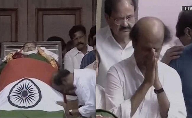 Tamil superstar Rajinikanth and popular actors Vijay and Dhanush paid their last respects to Tamil Nadu Chief Minister J. Jayalalithaa who died here on Monday night. Rajinikanth paid his respects with his wife and daughters. Rajinikanth,Dhanush,Rajinikanth pays last respect to Jayalalithaa,Dhanush pays last respect to CM Jayalalithaa,CM Jayalalithaa,last respect to Jayalalithaa,Jayalalithaa funeral,Jayalalithaa funeral pics