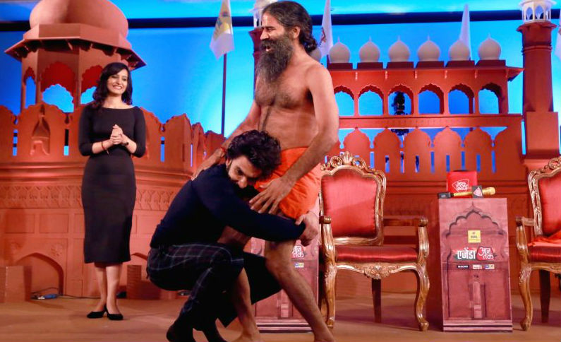 Photos of Bollywood actor Ranveer Singh performs Yoga with Baba Ramdev in New Delhi. Ranveer Singh performs Yoga,Ranveer Singh performs Yoga with Baba Ramdev,Ranveer Singh,Ranveer Singh and Baba Ramdev,Ranveer Singh with Baba Ramdev