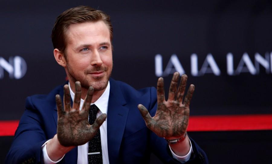 Photos of Emma Stone and Ryan Gosling place their hands in cement at the TCL Chinese theatre in Hollywood. Emma Stone and Ryan Gosling,Emma Stone,Ryan Gosling,Ryan Gosling and Emma Stone cemented,TCL Chinese theatre,Chinese theatre,Ryan Gosling and Emma Stone pics,Ryan Gosling and Emma Stone images,Ryan Gosling and Emma Stone photos,Ryan Gosling and Emma Stone
