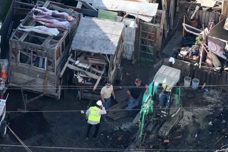 Artist materials are seen piled outside the burned warehouse following the fatal fire in the Fruitvale district of Oakland, California. Deadly California warehouse fire,California warehouse fire,California warehouse fire pics,California warehouse fire images,California warehouse fire photos,California warehouse fire stills,California warehouse fire pictures