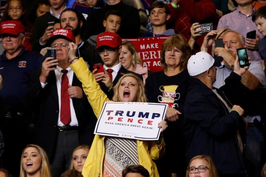 Supporters cheer for U.S. President-elect Donald Trump at a USA Thank You Tour event at Crown Coliseum in Fayetteville, North Carolina, U.S. Donald Trump,Donald Trump Thank You,Donald Trump Thank You tour,Donald Trump's Thank You Tour,USA Thank You Tour 2016,USA Thank You Tour,U.S. President-elect Donald Trump