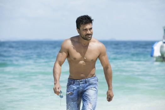 Photos of South Indian Actor Ram Charan flaunts Six Pack abs in Dhruva movie.