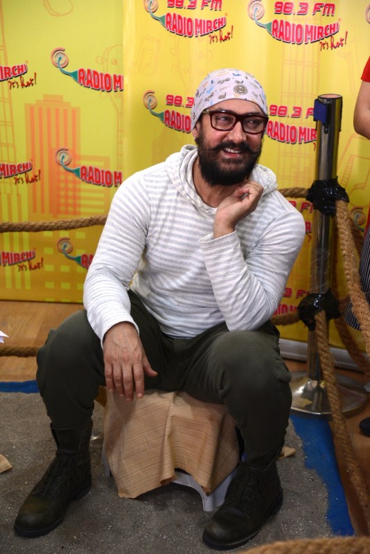 Photos of Bollywood actor Aamir Khan promotes Dangal movie at Radio Mirchi studio. Aamir Khan,actor Aamir Khan,Aamir Khan promotes Dangal movie,Aamir Khan promotes Dangal,Aamir Khan promotes Dangal at Radio Mirchi studio,Aamir Khan's Dangal,Dangal movie,Dangal movie promotion,Dangal movie promotion pics,Dangal movie promotion image