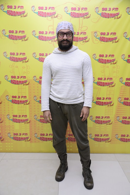 Photos of Bollywood actor Aamir Khan promotes Dangal movie at Radio Mirchi studio. Aamir Khan,actor Aamir Khan,Aamir Khan promotes Dangal movie,Aamir Khan promotes Dangal,Aamir Khan promotes Dangal at Radio Mirchi studio,Aamir Khan's Dangal,Dangal movie,Dangal movie promotion,Dangal movie promotion pics,Dangal movie promotion image
