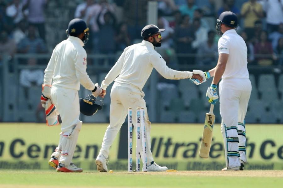 A resilient Jos Buttler (76) guided them to mark at the Wankhede Stadium post lunch. He was given company by Jake Ball. They put on 54 runs for the ninth wicket. England,India vs England,India vs England 2016,India vs England fourth test,India vs England test,India vs England Test Series,india vs england test series 2016,Ravichandran Ashwin,Ashwin