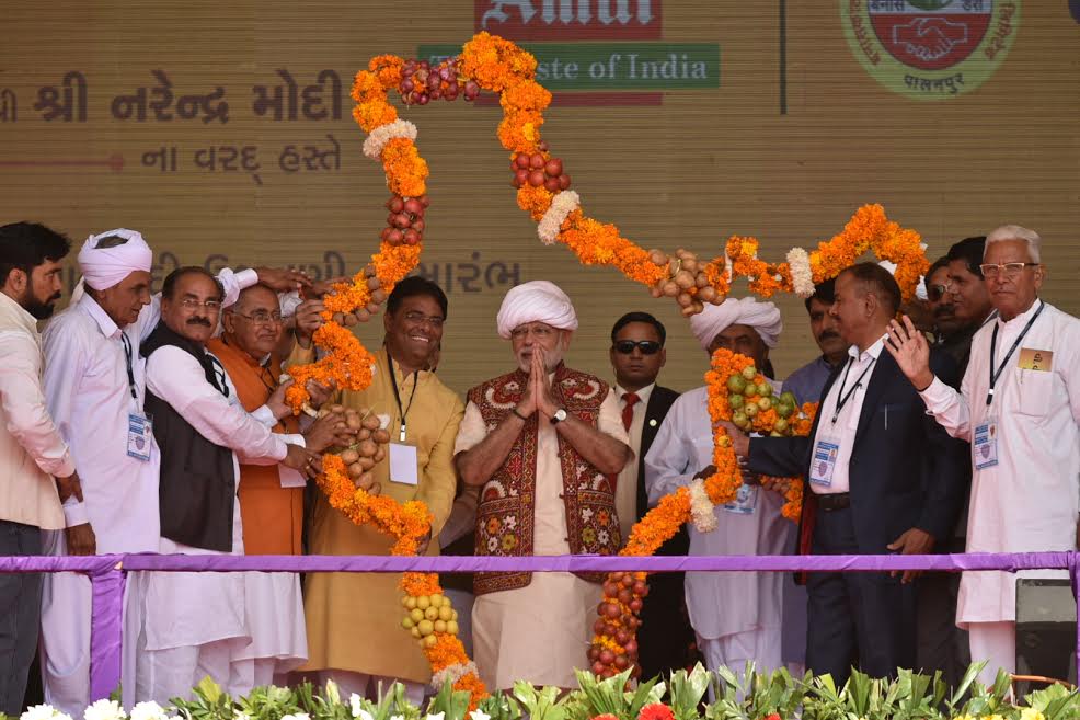 Photos of PM Narendra Modi at the inauguration ceremony of Amul Cheese Plant & Whey Drying Plant in Palanpur, Banaskantha. Narendra Modi,Narendra Modi inaugurates Amul Cheese Plant,Amul Cheese Plant & Whey Drying Plant,Amul Cheese Plant,Whey Drying Plant,Narendra Modi in Palanpur,PM Modi to address farmers,Modi to address farmers