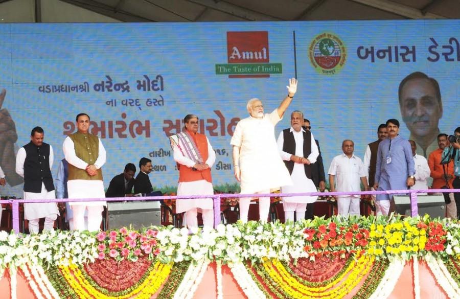 Photos of PM Narendra Modi at the inauguration ceremony of Amul Cheese Plant & Whey Drying Plant in Palanpur, Banaskantha. Narendra Modi,Narendra Modi inaugurates Amul Cheese Plant,Amul Cheese Plant & Whey Drying Plant,Amul Cheese Plant,Whey Drying Plant,Narendra Modi in Palanpur,PM Modi to address farmers,Modi to address farmers