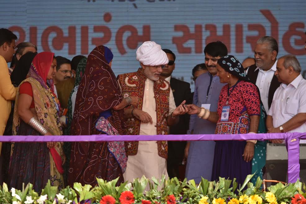 Photos of PM Narendra Modi at the inauguration ceremony of Amul Cheese Plant & Whey Drying Plant in Palanpur, Banaskantha. Narendra Modi,Narendra Modi inaugurates Amul Cheese Plant,Amul Cheese Plant & Whey Drying Plant,Amul Cheese Plant,Whey Drying Plant,Narendra Modi in Palanpur,PM Modi to address farmers,Modi to address farmers