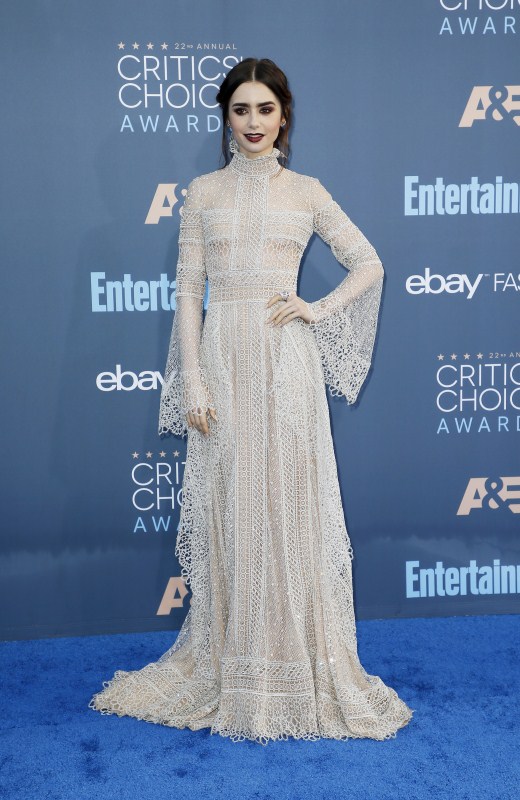 Actress Lily Collins arrives at the 22nd Annual Critics' Choice Awards in Santa Monica, California, U.S., December 11, 2016. Best Dressed celebrities,22nd Annual Critics' Choice Awards 2016,Choice Awards 2016,Lily Collins,Kate Beckinsale,Mandy Moore,Jessica Biel,Susan Kelechi Watson,Amy Adams,Viola Davis,Emmy Rossum,Ryan Reynolds,Lucas Jade Zumann,Christian Slater,Samantha