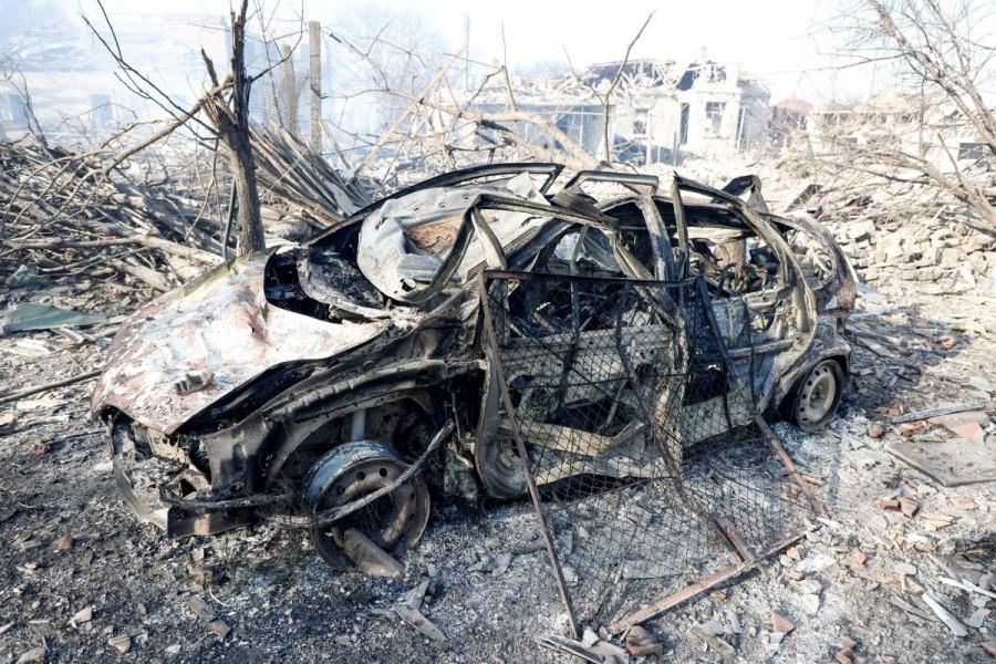 A car which is destroyed after a cargo train derailed and exploded is pictured in the village of Hitrino, Bulgaria. Train derailment,Bulgaria train derailment,cargo train derails,Bulgaria,7 Killed,29 Injured in Bulgarian Tanker Train Explosion,Bulgarian Tanker Train Explosion,Tanker Train Explosion,freight train derailed