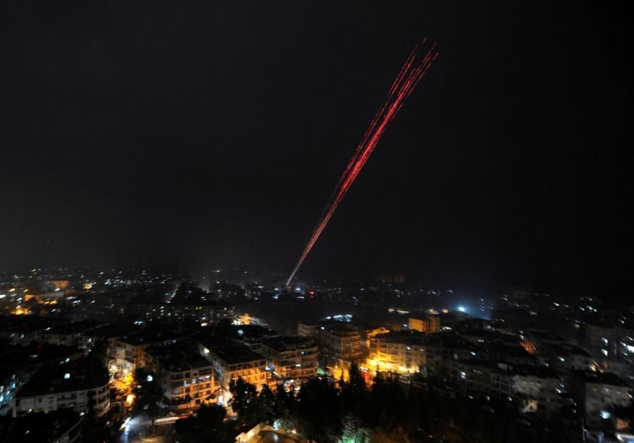 Govermental Syrian forces fire into sky as celebrating their victory against rebels in eastern Aleppo, Syria December 12,2016. Aleppo's rebels,Aleppo rebels,Rebels Holding Out in Aleppo Video,Aleppo Video,Beleaguered Rebels,President Bashar al-Assad,Bashar al-Assad