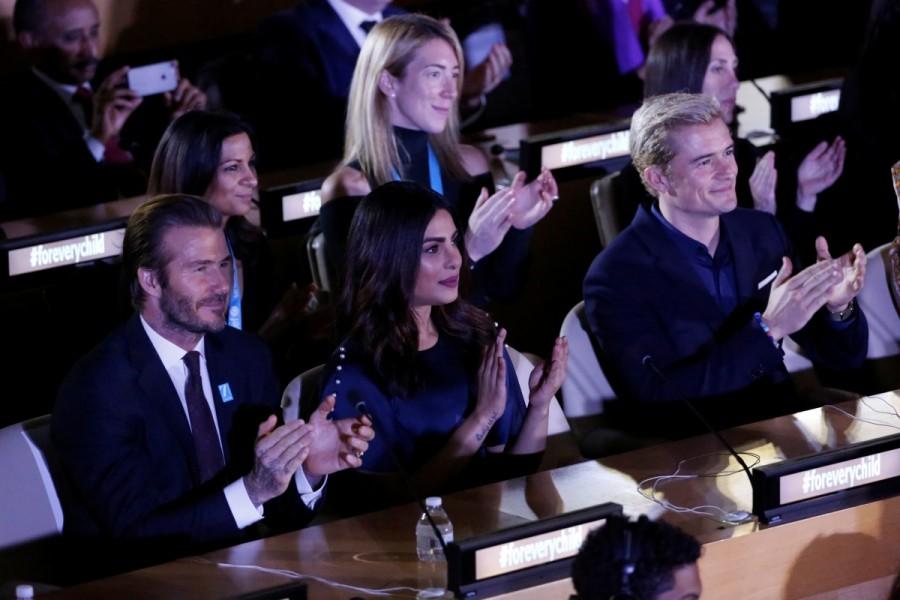 (L-R) David Beckham, Priyanka Chopra and Orlando Bloom watch on at the UNICEF 70th anniversary event at the United Nations Headquarters in Manhattan, New York City, U.S., December 12, 2016. Priyanka Chopra,David Beckham,Orlando Bloom,UNICEF Global Goodwill Ambassador,UNICEF 70th anniversary,United Nations Headquarters