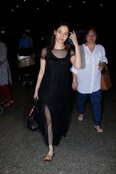 Photos of South Indian actress Tamannaah Bhatia spotted at Mumbai airport, in Mumbai on December 13, 2016.