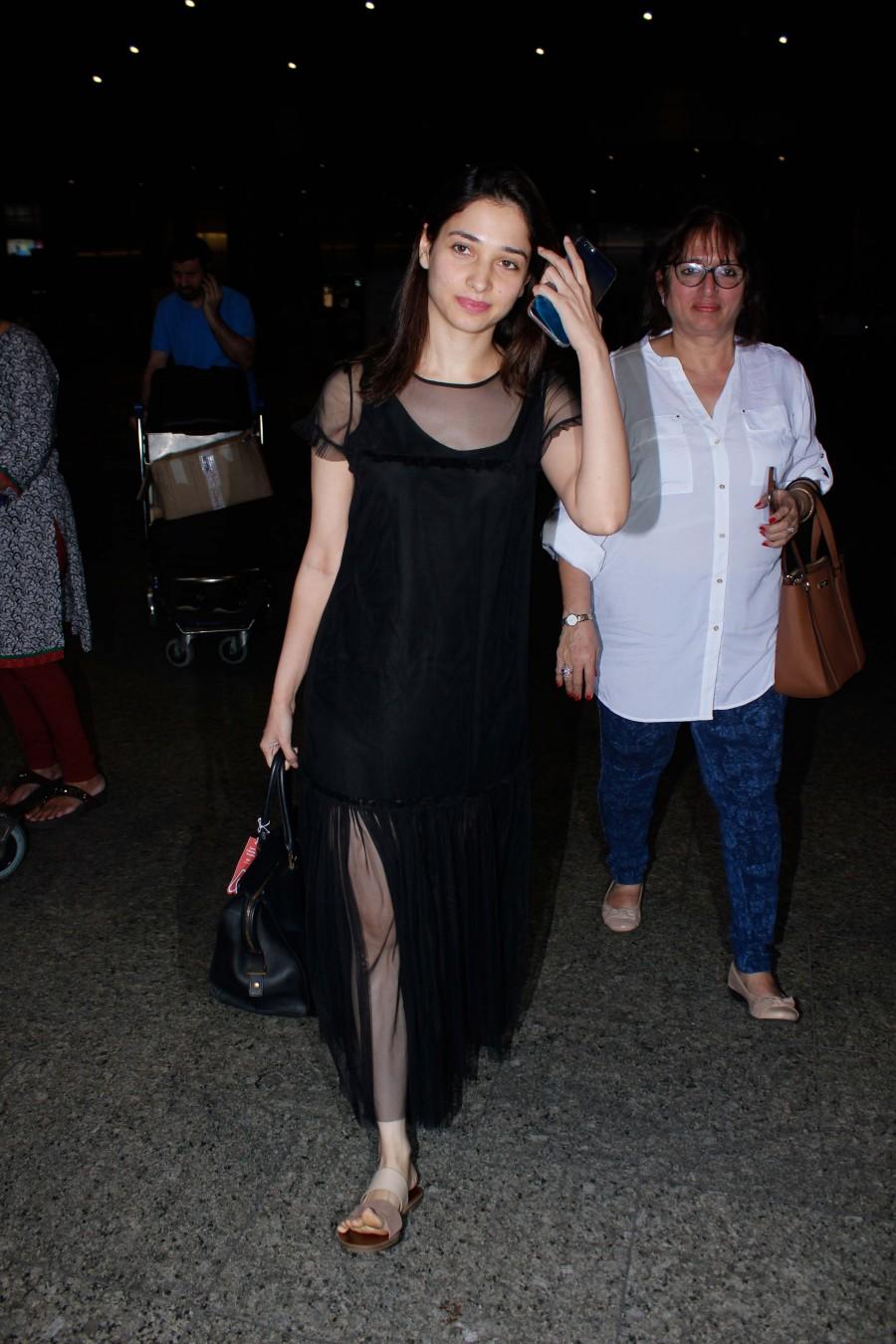 Photos of South Indian actress Tamannaah Bhatia spotted at Mumbai airport, in Mumbai on December 13, 2016. Tamannaah Bhatia,Tamannaah,actress Tamannaah Bhatia,Tamannaah spotted at Mumbai airport,Tamannaah at Mumbai airport,Tamannaah new pics,Tamannaah new images,Tamannaah new photos,Tamannaah new stills,Tamannaah new pictures