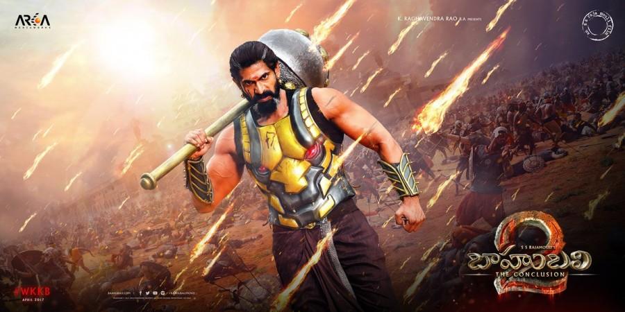 Ferocious King Bhallaladeva in the new poster of Baahubali 2: The Conclusion! Rana Daggubati who is celebrating his birthday today revealed the first look of his ferocious character of King Bhallaladeva. The actor along with director SS Rajamouli unveiled his first look in the poster from Baahubali 2.- The Conclusion. Rana who is playing the role of an antagonist and powerful Bhallaladeva is standing tall and powerful in this new poster. Rana Daggubati,Rana Daggubati as Bhallaladeva,Bhallaladeva,Baahubali 2,Rana Daggubati in Baahubali 2,Rana Daggubati first look in Baahubali 2,Rana Daggubati first look Baahubali 2,Telugu movie Baahubali 2,Baahubali 2 pics,Baahubali 2 images,Baahubali 2 ph