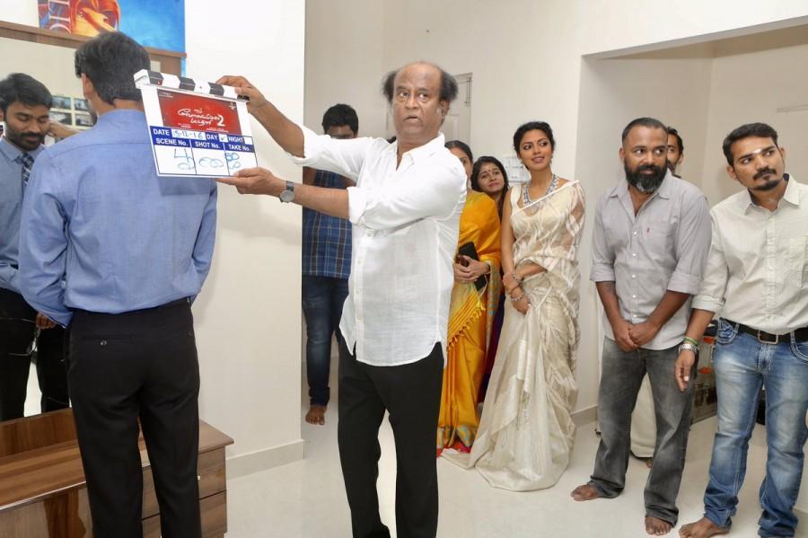 Dhanush tweeted: "What more can I ask? Thanks Thalaiva. With all your blessings, ‘VIP 2' kickstarts from today. Raghuvaran is back." The actor also posted photographs from the opening day in which Rajinikanth can be seen holding the clapperboard and blessing the film's team on the new venture. Rajinikanth,Superstar Rajinikanth,Dhanush,Amala Paul,VIP 2,VIP 2 movie launch,VIP 2 movie pooja,VIP 2 movie launch pics,VIP 2 movie launch images,VIP 2 movie launch photos,VIP 2 movie launch stills,VIP 2 movie launch pictures