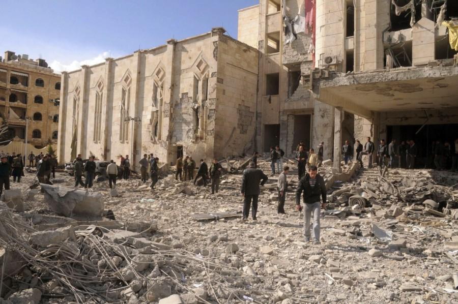 Syrian security inspect the site of an explosion in Syria's northern city of Aleppo February 10, 2012, in this handout photograph released by Syria's national news agency SANA. Twin bomb blasts hit Syrian military and security buildings in Aleppo, killing 25 people in what was the worst violence to hit the country's commercial hub since the 11-month uprising against President Bashar al-Assad began. Aleppo,Pray for Aleppo,Aleppo rebel evacuation,Aleppo evacuation,Syrian city Aleppo,Aleppo: Since the beginning