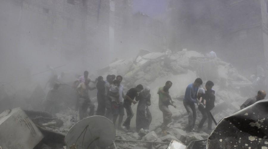 Men help evacuate civilians at a site hit by what activists said was shelling by forces loyal to Syria's President Bashar al-Assad in Aleppo's Bustan al-Qasr district, August 16, 2013. Aleppo,Pray for Aleppo,Aleppo rebel evacuation,Aleppo evacuation,Syrian city Aleppo,Aleppo: Since the beginning