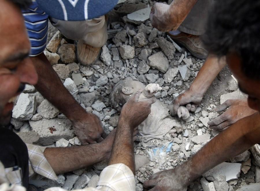 A man holds the hand of a young girl who was killed during a recent Syrian Air force air strike in Azaz, some 47 km (29 miles) north of Aleppo, August 15, 2012. Aleppo,Pray for Aleppo,Aleppo rebel evacuation,Aleppo evacuation,Syrian city Aleppo,Aleppo: Since the beginning