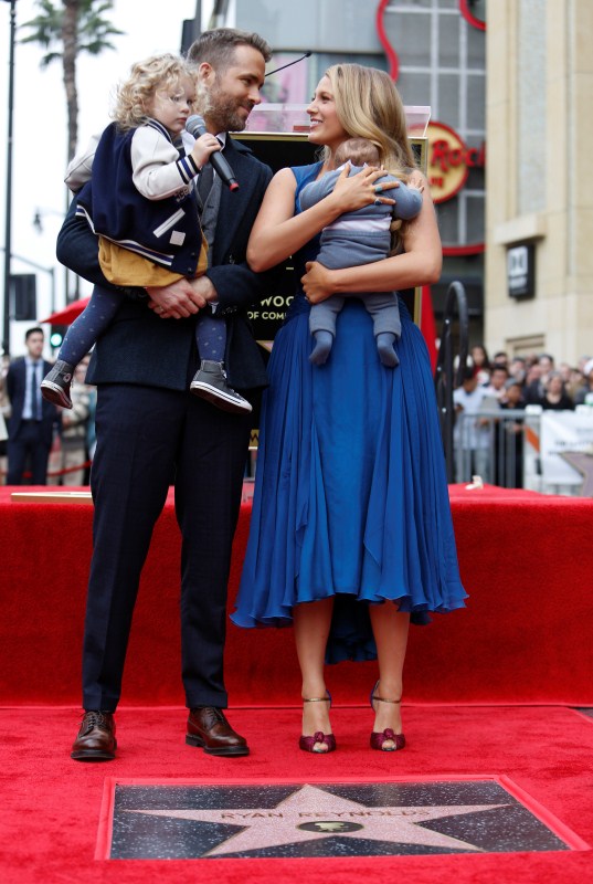 Actor Ryan Reynolds with his daughters James (L) and wife Blake Lively pose on his star on the Hollywood Walk of Fame in Hollywood, California U.S., December 15, 2016. Ryan Reynolds,Blake Lively,Ryan Reynolds and Blake Lively,Ryan Reynolds and Blake Lively daughters,Ryan Reynolds daughters,Blake Lively daughters