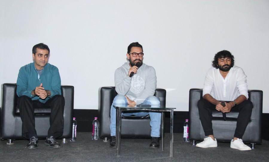 Just when everyone was expecting a Dangal treat to be delivered by Aamir, the actor unveiled the teaser of his next film Secret Superstar that stars his Dangal daughter Zaira Wasim in the lead. The teaser launch was successfully kept under wraps by the makers and the impromptu teaser break sent social media abuzz. Aamir Khan,Advit Chandan,Akash Chawla,Secret Superstar,Secret Superstar trailer,Secret Superstar trailer launch,Actor Aamir Khan,Secret Superstar trailer launch pics,Secret Superstar trailer launch images,Secret Superstar trailer launch photos,Secret Supe