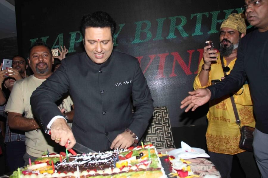 Bollywood actor Govinda celebrates his 53rd birthday in Mumbai, India on December 21, 2016. The actor announced his new film AA Gaya Hero on his birthday, the film will release on 24th February 2017. Govinda,actor Govinda,Govinda 53rd birthday,Govinda birthday,Govinda birthday celebrations,Govinda birthday celebrations with Media,AA Gaya Hero,Govinda celebrates his 53rd birthday