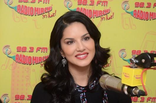 Bollywood actress Sunny Leone promotes Laila Mai Laila song from Raees at Mirchi 98.3 studio.