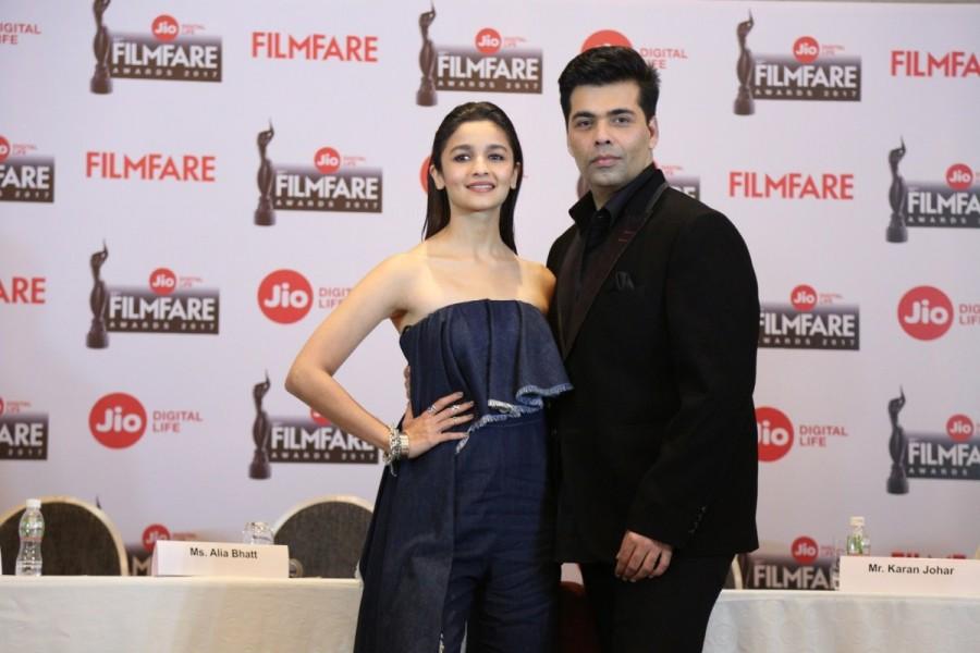 Director Karan Johar and actress Alia Bhatt during the launch event of the 62nd Jio Filmfare Awards 2017 in Mumbai on Dec 23, 2016. Karan Johar,Alia Bhatt,Editor Jitesh Pillai,Jio Filmfare Awards press conference,Jio Filmfare Awards,Jio Filmfare Short Film Awards 2017,Jio Filmfare Awards pics,Jio Filmfare Awards images,Jio Filmfare Awards photos,Jio Filmfare Awards stills,Jio Filmfare