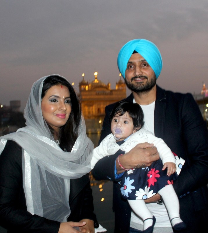 Indian cricketer Harbhajan Singh with his wife Geeta Basra and daughter Hinaya Heer Plaha pay obeisance at the Golden Temple in Amritsar on Dec 22, 2016. Harbhajan Singh,Geeta Basra,Harbhajan Singh and Geeta Basra,Hinaya Heer Plaha,Harbhajan Singh daughter Hinaya,Harbhajan Singh daughter Hinaya Heer Plaha,Golden Temple,Geeta Basra daughter,Geeta Basra daughter Hinaya Heer Plaha