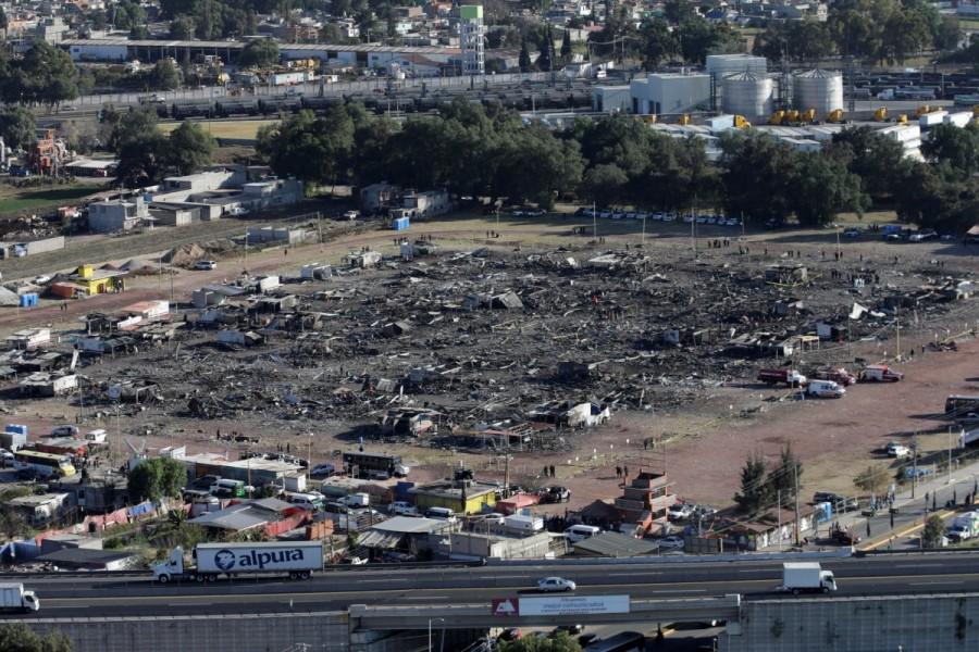 An aerial view shows the San Pablito fireworks market after an explosion, outside the Mexican capital on Tuesday, in Tultepec, Mexico, December 21, 2016. Mexico fireworks market,mexico fireworks market blast,Deadly blast at Mexico,Mexico blast,fireworks market,San Pablito fireworks market,San Pablito fireworks,Mexican capital,Tultepec