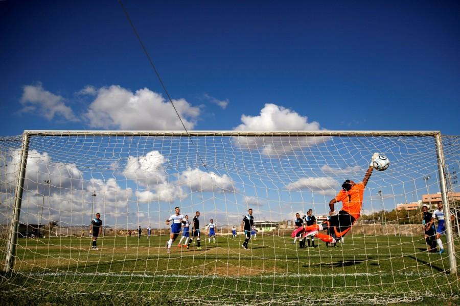 Players from Israeli soccer clubs affiliated with Israel Football Association, Ariel Municipal Soccer Club and Maccabi HaSharon Netanya, play against each other at Ariel Municipal Soccer Club's training grounds in the West Bank Jewish settlement of Ariel. Israeli,life in Israeli,Life in Israeli settlements,U.N. Security Council