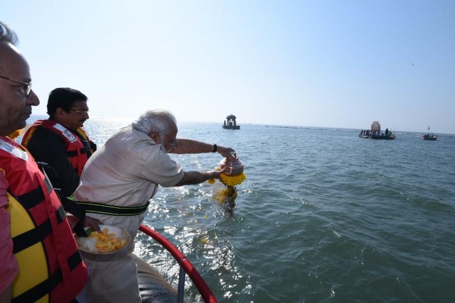 Prime Minister Narendra Modi on Saturday travelled in an Indian Coast Guard hovercraft to perform a symbolic 'jal-pujan' for the proposed Rs 3,600 crore memorial of Chhatrapati Shivaji Maharaj. Narendra Modi,PM Narendra Modi,Modi,Bhoomi Pooja,Shivaji statue,ShivSmarak,Shiv Smarak,Shivaji statue in Mumbai,Chhatrapati Shivaji Maharaj,jal-pujan