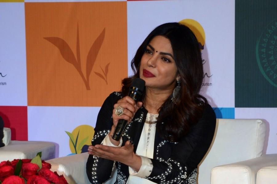 Actress and brand ambassador of Assam tourism Priyanka Chopra addresses during a programme organised by Assam tourism in Guwahati on Dec 24, 2016. Sarbananda Sowonal,Assam Chief Minister Sarbananda Sowonal,Chief Minister Sarbananda Sowonal,Priyanka Chopra,actress Priyanka Chopra,Rhino,Assam tourism,Brand Ambassador Of Assam Tourism