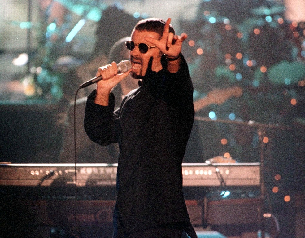 Singer George Michael performs "Living For The City" during the VH1 Honors Awards concert April 10, 1997 in Los Angeles. George Michael,george michael dead,George Michael death,George Michael photos,life in photos,George Michael with princess Diana,George Michael Paul McCartney,George Michael dies at 53,British singer George Michael